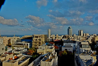 High angle view of townscape against blue sky