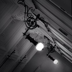 Low angle view of illuminated ceiling