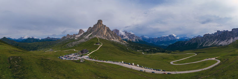 Panoramic view of road amidst mountains against sky