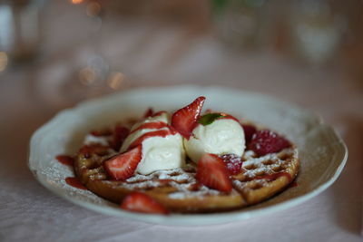 Close-up of food in plate on table