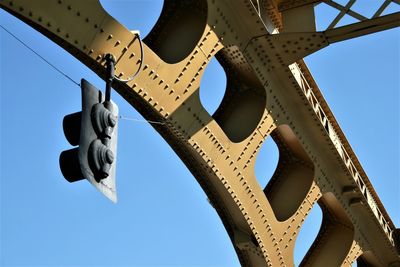 Low angle view of text against clear blue sky