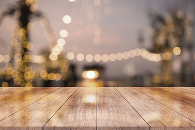 Close-up of illuminated lights on table