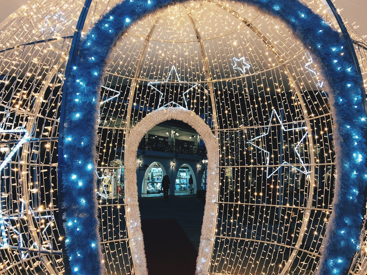 VIEW OF ILLUMINATED ARCH WINDOW