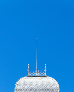 Low angle view of building against clear blue sky