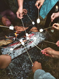 High angle view of people holding hands