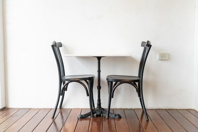 Empty chairs and table at home