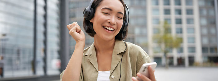 Young woman using mobile phone