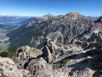 Scenic view of rocky mountains against clear sky