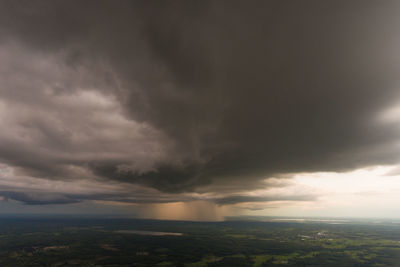 Storm clouds over landscape