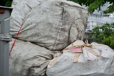 Stacked sacks in city