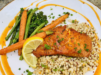 High angle view of fish in plate on table