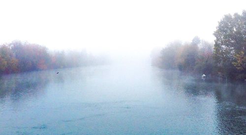 Scenic view of lake during foggy weather