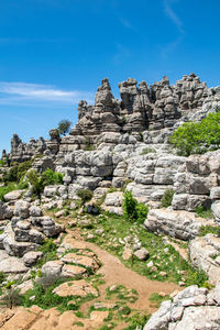 Pathways through the magical weather worn peaks and valleys of torcal in antequera, spain