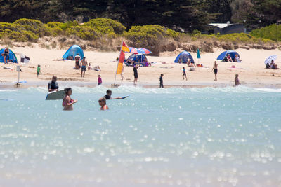 People enjoying at beach