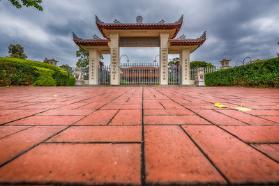 View of building against cloudy sky