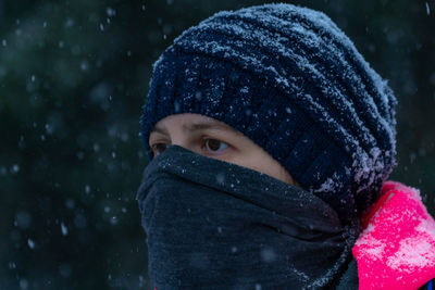 Portrait of boy in snow