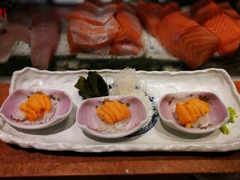 Close-up of sushi served on table