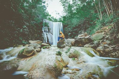 View of waterfall in forest