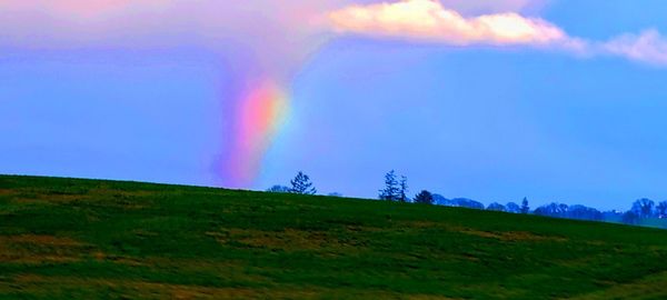 Scenic view of rainbow against sky