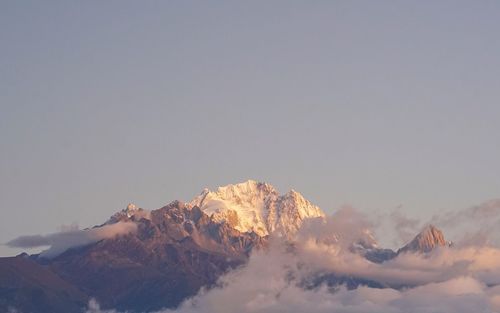 Scenic view of snow mountains against clear sky