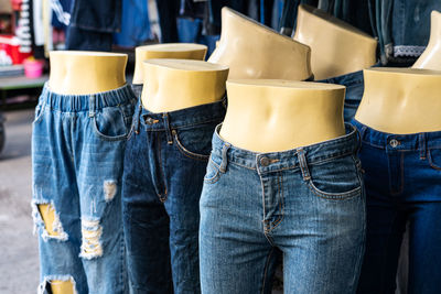 Clothes displayed on mannequins at shop