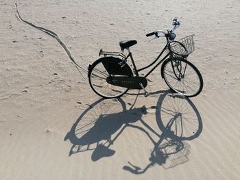 High angle view of bicycle parked on wall