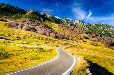 Scenic view of mountain road against sky