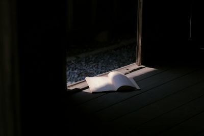 Open book on window sill