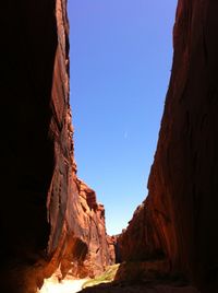 Scenic view of cliff against clear sky