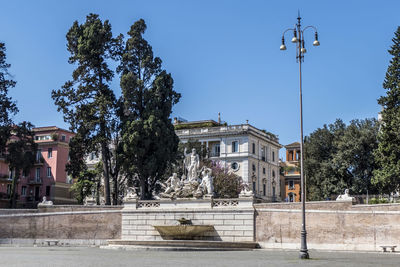 The fountain of neptune in popolo square in rome