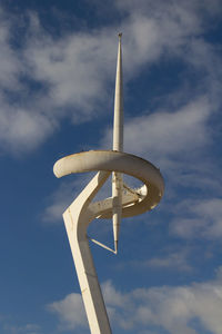 Low angle view of telephone pole against sky