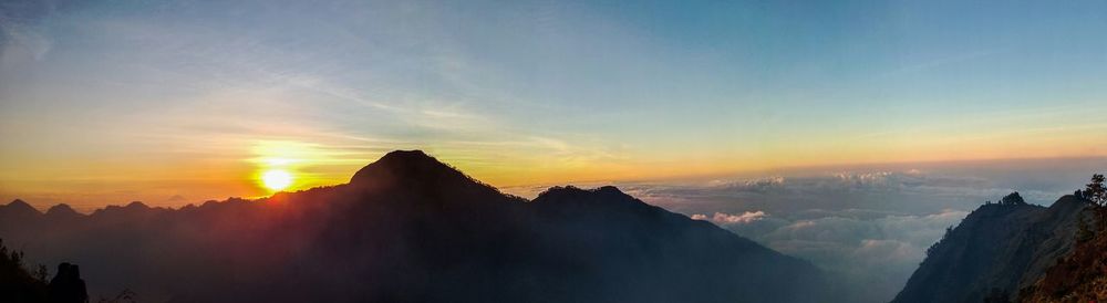 Scenic view of mountains at sunset