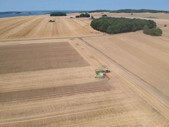 High angle view of vehicles on field