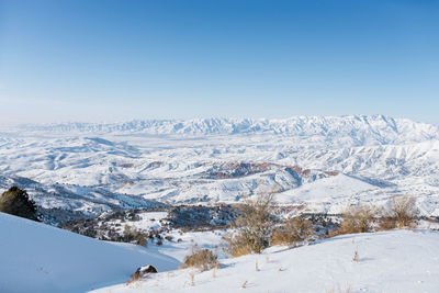 An incredibly beautiful panorama of the winter mountains of the tien shan in uzbekistan