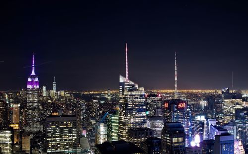 Illuminated cityscape at night