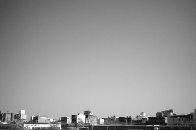 Cityscape against clear sky