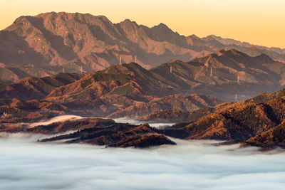 Scenic view of snowcapped mountains against sky