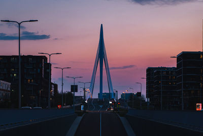 Low angle view of modern buildings against sky at dusk