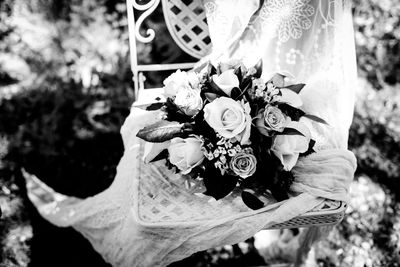 Close-up of hand holding bouquet