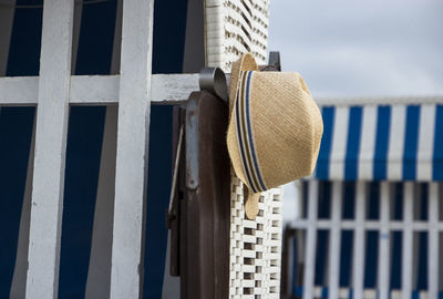 Close-up of clothes hanging on wood