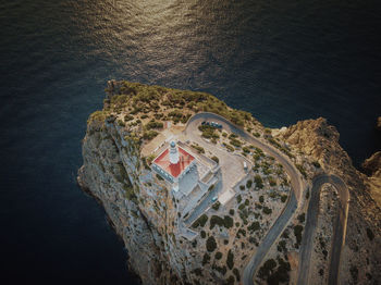 High angle view of rock on beach by sea