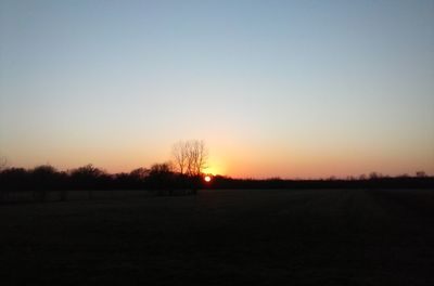 Scenic view of landscape at sunset