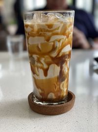 Close-up of ice cream in glass on table