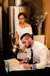 Young couple looking at camera