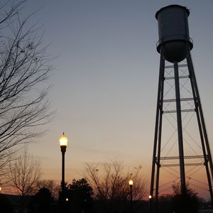 Low angle view of water tower against clear sky