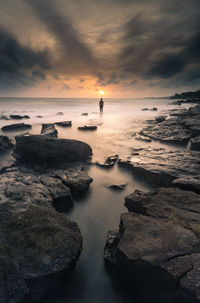 Scenic view of sea against sky during sunset