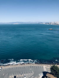High angle view of sea against blue sky