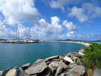 Scenic view of bay against sky