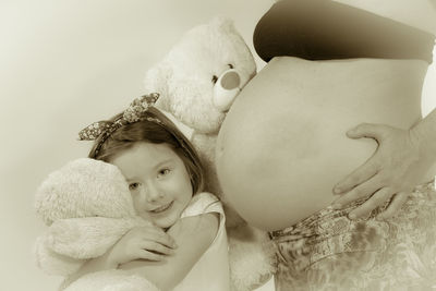 Portrait of cute girl with toy