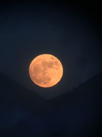 Scenic view of moon against sky at night